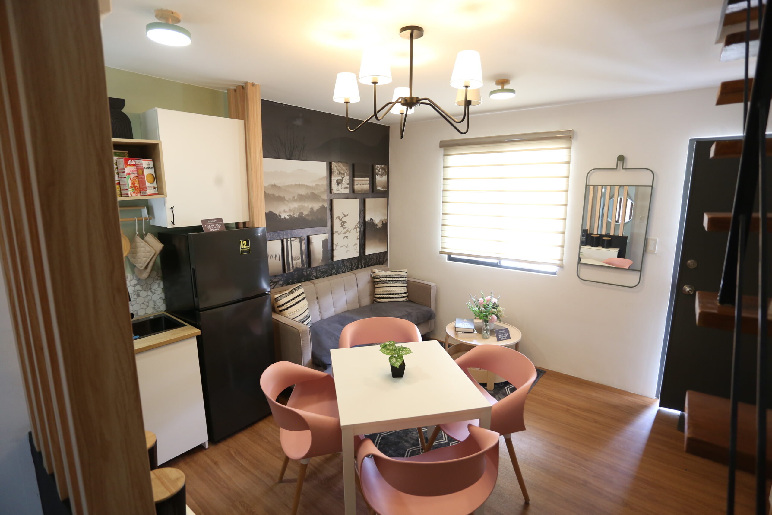 Cozy Bacolod Template VISMIN apartment interior with dining area, seating, and kitchenette.